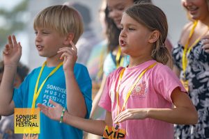 On stage singing and dancing to Forrest Frank's "Your Way's Better" - SonRise Music Festival 9-13-2025 at 24th St Park in VA Beach, VA