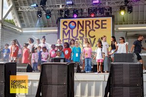 On stage singing and dancing to Forrest Frank's "Your Way's Better" - SonRise Music Festival 9-13-2025 at 24th St Park in VA Beach, VA