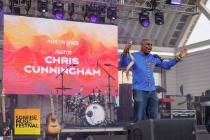 Pastor Chris Cunningham blows the Shofar at the beginning of SonRise Music Festival Sat 9-13-2025 at 24th St Park in VA Beach, VA. Photo Annette Holloway Photography for SonRise