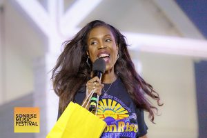 Co-emcee Shannon Kendrick with giveaways - SonRise Music Festival Sat 9-13-2025 at 24th St Park in VA Beach, VA. Photo Annette Holloway Photography for SonRise