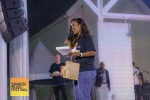 Co-emcee Shannon Kendrick with giveaways - SonRise Music Festival Sat 9-13-2025 at 24th St Park in VA Beach, VA. Photo Annette Holloway Photography for SonRise